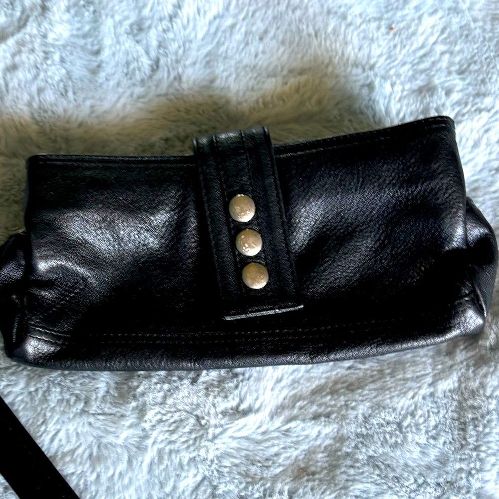 Three section wristlet. Beautiful designer black leather.